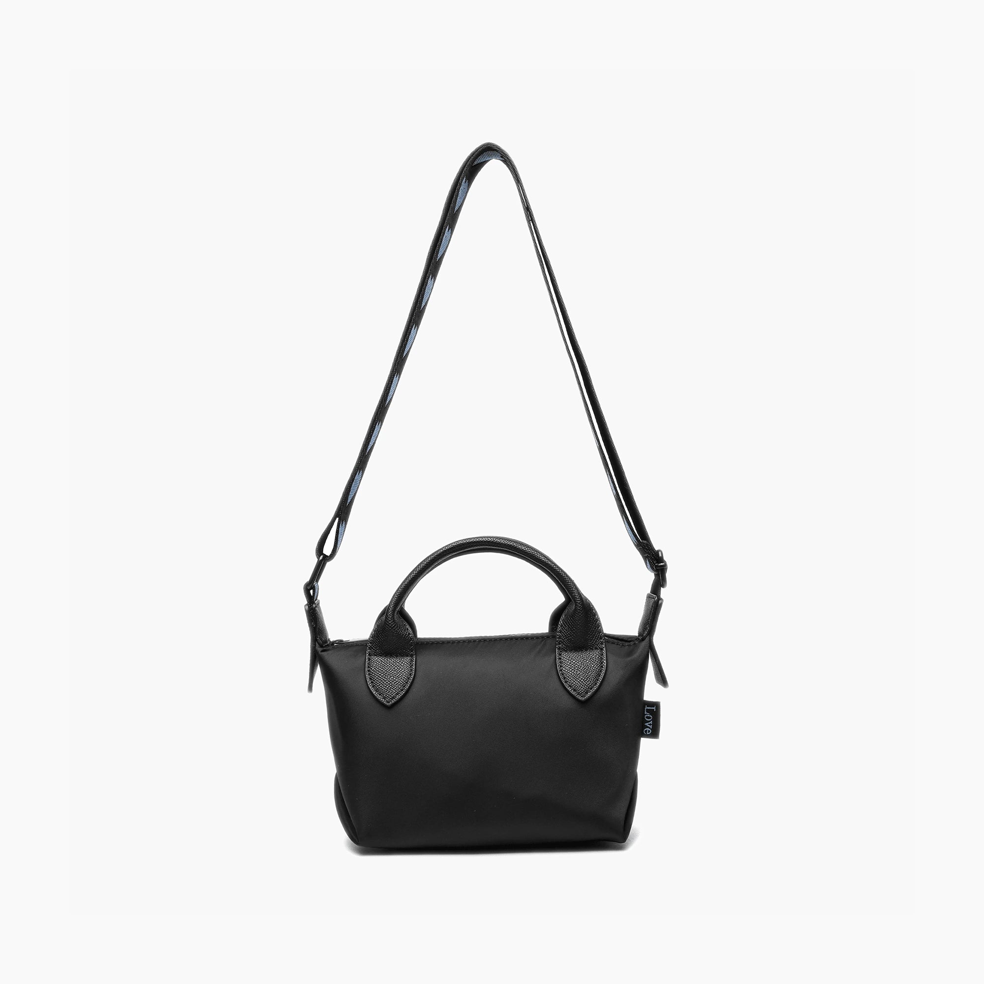 a black mini crossbody bag