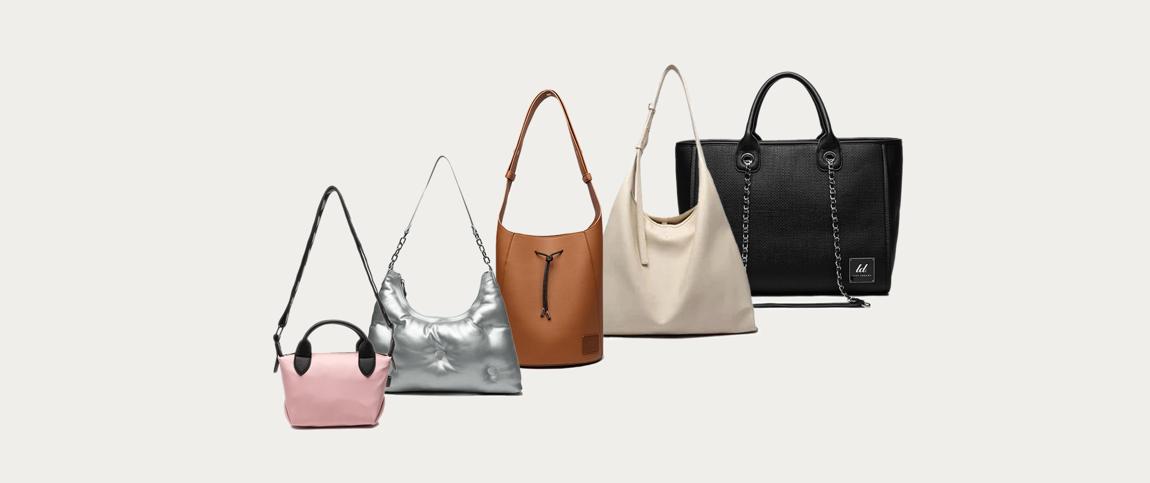 There are five bags in the photo, from left to right: a pink crossbody bag, a silver shoulder bag, a brown tote bag, a white tote bag, and a black tote bag.