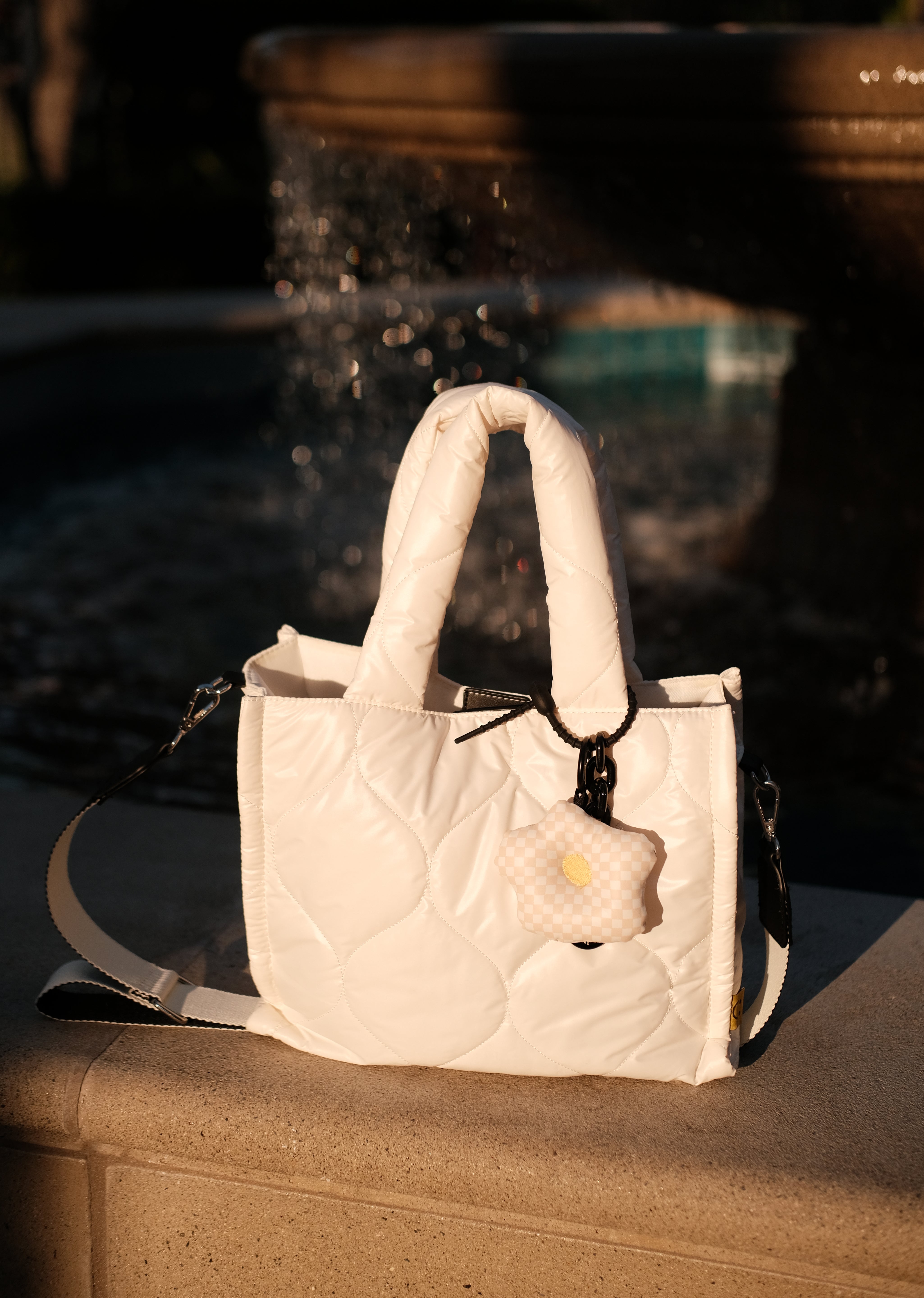 a white puffer tote bag