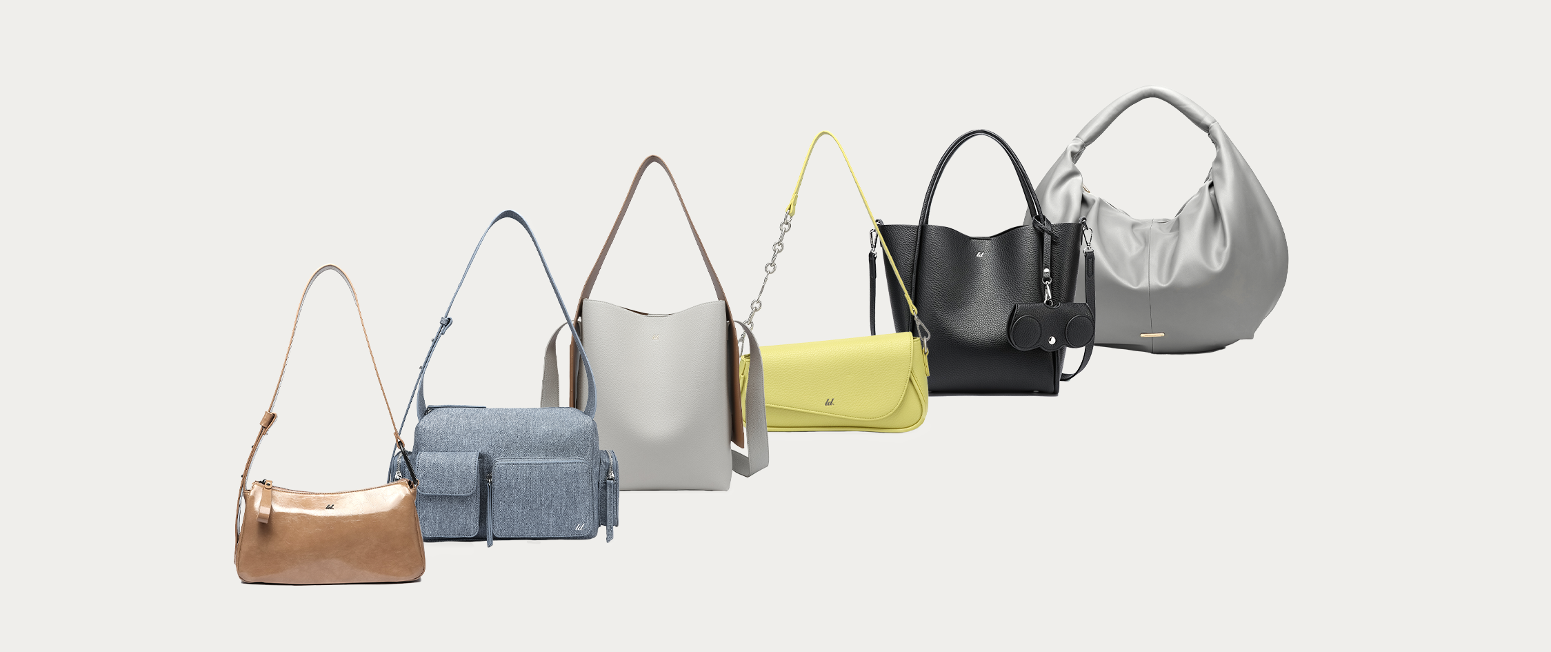 Five bags: brown shoulder bag, blue shoulder bag, grey tote bag, yellow shoulder bag, black tote bag, and grey shoulder bag.